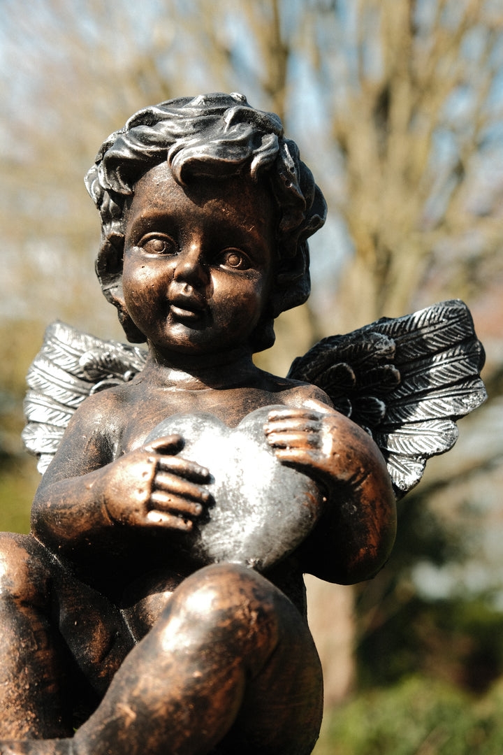 Bronze Effect Cherub With Heart Sitting Angel Garden Decoration Ornament