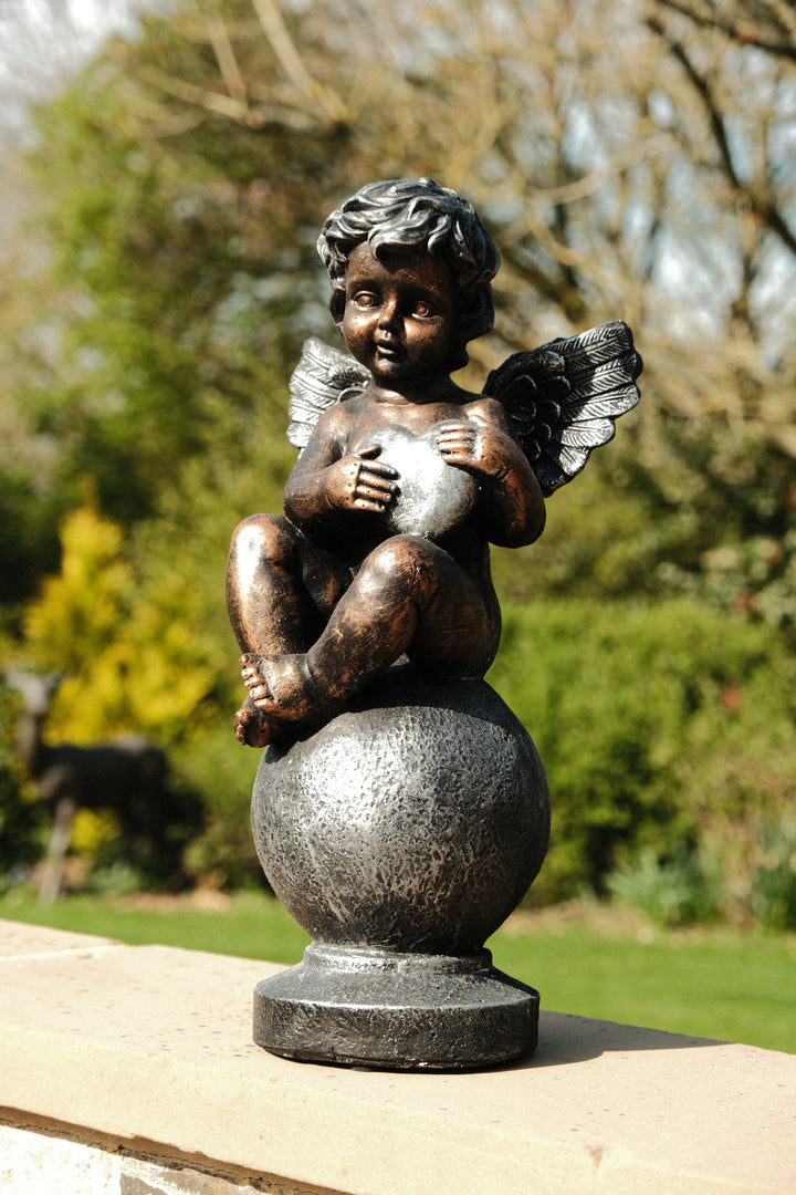 Bronze Effect Cherub With Heart Sitting Angel Garden Decoration Ornament