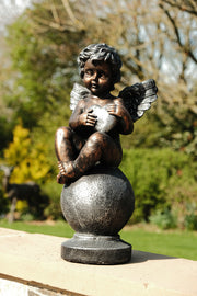 Bronze Effect Cherub With Heart Sitting Angel Garden Decoration Ornament